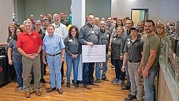 Trig’s grocer honored for excellence