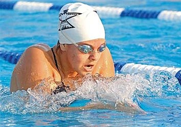 LUHS girls’ swim soaks up the sun in first ever outdoor meet