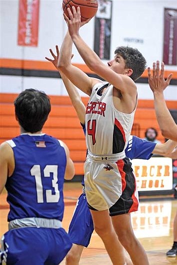Mercer boys’ basketball loses playoff game to Prentice