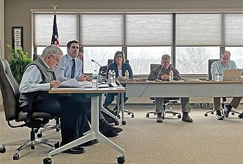 Minocqua town board proposes draft permit for piers