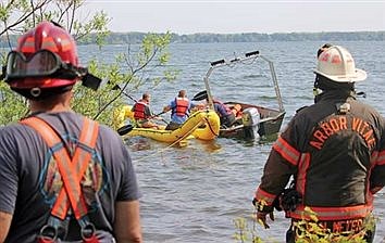 SUV fully submerges in Big Arbor Vitae on Monday