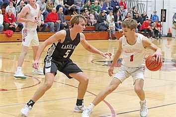 Medford edges LUHS boys’ basketball in conference opener