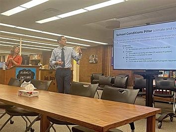 LUHS leadership team briefs board with first improvement plan update