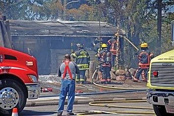 Fire destroys shop at Arbor Vitae business