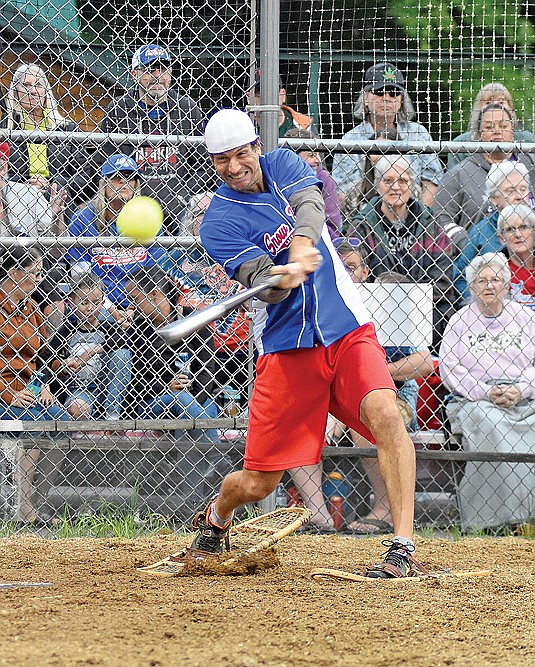 Paul Miller hits an inside-the-park grand slam to right field in the sixth inning of a 15-11 win over Black Bear Bar Monday, July 17 at Snowshoe Park in Lake Tomahawk. (Photo by Brett LaBore/Lakeland Times)