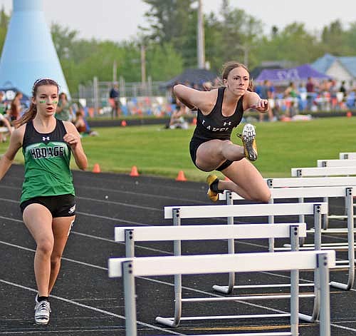 In this May 22, 2023 file photo, Norah Strasburg leaps over the hurdle in the 300-meter hurdles during a WIAA Division 2 regional meet at Colby High School. (Photo by Brett LaBore/Lakeland Times)