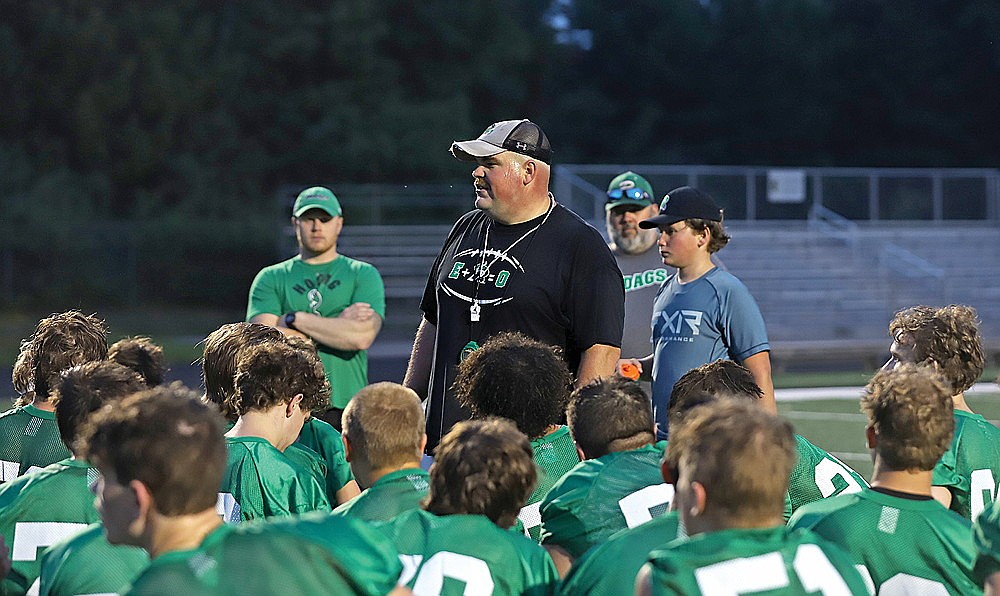 Rhinelander High School football coach Aaron Kraemer addresses his team following its first practice of the fall at Mike Webster Stadium Tuesday, Aug. 1. (Bob Mainhardt for the River News)