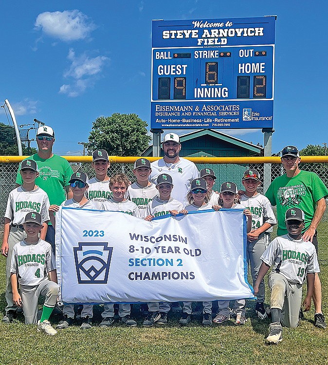 The Hodag Little League 10U All-Star team poses with its sectional championship banner after defeating Superior 9-2 on Sunday, July 30, completing a two-game sweep of the teams’ Section 2 championship series in Superior. Pictured in the front row, from left to right are Jeter Vander Gailen and Jaxon Eades. In the second row are Easton Ostrom, William Sundby, Blake Sundby, Rylan Pasanen, Cooper Clark and Mason Paulson. In the third row are Easton Sieker, Eli Bauer, Nick Schneider and Griffin Rady. In the back row are manager Dan Bauer, coach Josh Clark and coach Jeremy Vander Gailen. The Hodags will return to Superior beginning this Saturday for the Wisconsin Little League 10U state championship series. (Submitted photo)