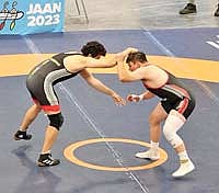 Leonard Chosa, right, brought home a gold medal for Team Wisconsin in wrestling at the 90kg weight class during the 10th North American Indigenous Games July 15-23 in Nova Scotia, Canada. Chosa was one of two Lac du Flambeau athletes who won a gold medal. Jayda Livingston won a gold medal as part of Team Wisconsin’s volleyball team. (Contributed photograph)