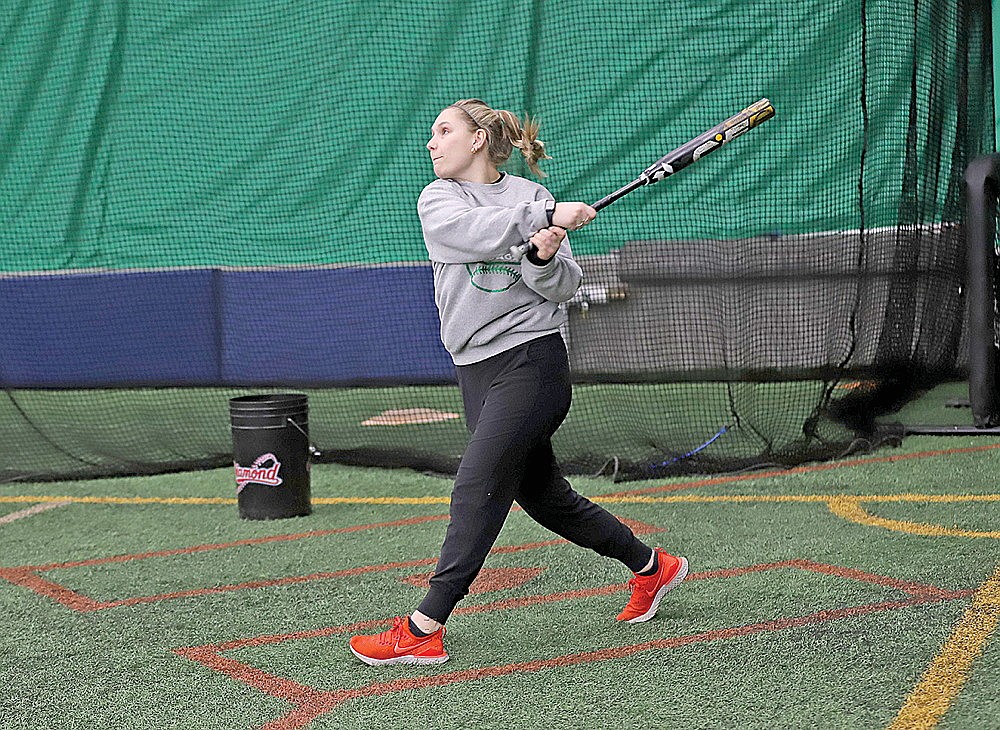 In this March 13, 2023 file photo Sadie Adamski hits a fly ball during Rhinelander High School softball practice in the Hodag Dome. Adamski and Ali Bender have been promoted to co-head coaches of the program, replacing D.J. DeMeyer, who stepped down at the end of the 2023 season. (Bob Mainhardt for the River News)