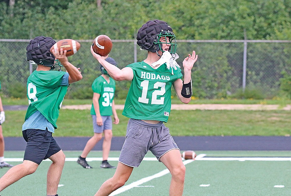 Truman Lamers throws a pass during Rhinelander High School football practice Tuesday, Aug. 1. Lamers, a junior, takes over as the starting quarterback for a new-look Hodag offense this fall. (Jeremy Mayo/River News)