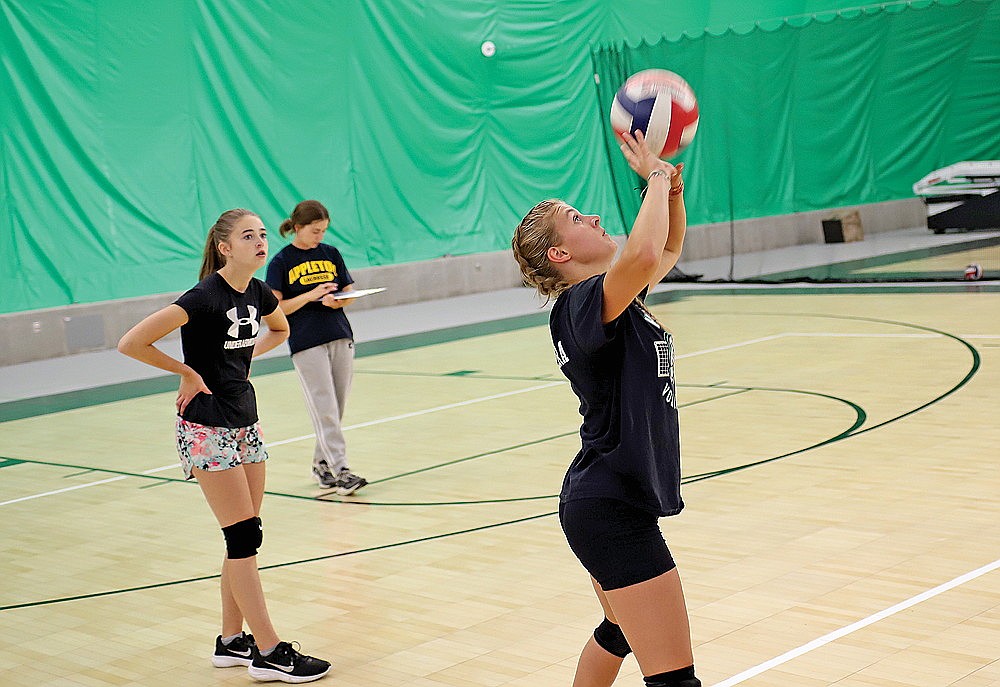 Emma Chiamulera sets the ball during Rhinelander High School volleyball practice in the Hodag Dome Monday, Aug. 14. The team will be in the Hodag Dome during the first couple of weeks of the season while the Jim Miazga Community Gym Floor is being resurfaced. (Bob Mainhardt for the River News)