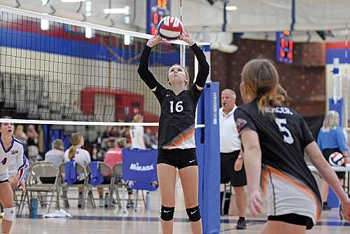 Ryley Saarnio sets the ball in a scrimmage vs. Northland Pines Saturday, Aug. 19 at Northland Pines High School in Eagle River. Saarnio is one of several new Tigers who will see playing time this season. (Photo by Brett LaBore/Lakeland Times)