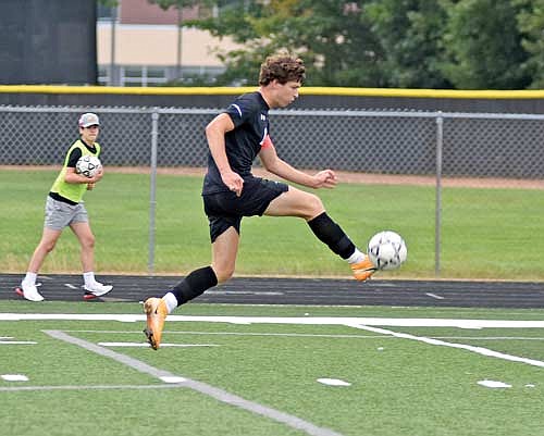 Yaroslav Myshchyshyn gathers the ball in mid-air before scoring his first goal of the game in the first half of a 5-2 win over Three Lakes Tuesday, Aug. 22 at IncredibleBank Field in Minocqua. Myshchyshyn scored four goals in the game, including a hat trick in the first half. (Photo by Brett LaBore/Lakeland Times)