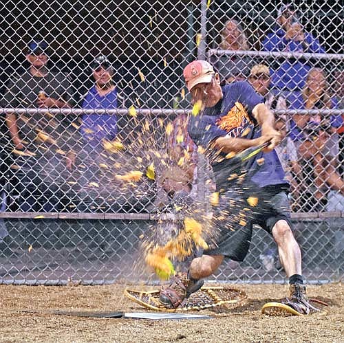 Keith Kind of WPS Local 420 destroys the melon ball in the seventh inning against the Snowhawks Monday, Aug. 21 at Snowshoe Park in Lake Tomahawk. (Photo by Brett LaBore/Lakeland Times)