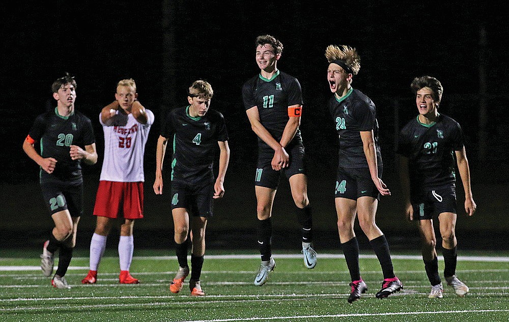 Rhinelander’s Will Gretzinger (24) celebrates a goal, joined by teammates Matthew King (20), Michael Schiek (4), Will Quinn (11) and Dalton Fritz (21) during the second half of a GNC boys’ soccer game against Medford at Mike Webster Stadium Tuesday, Aug. 29. Gretzinger’s goal was the difference as the Hodags won the game, 1-0. (Bob Mainhardt for the River News)