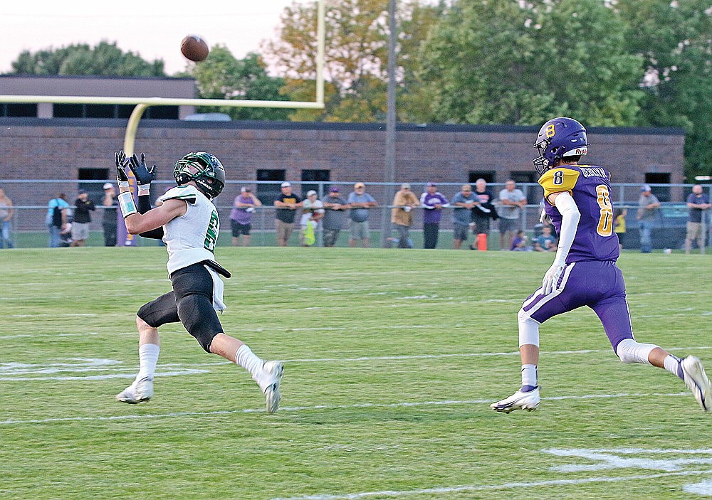 Rhinelander’s Zach Germain hauls in a pass over Ashland’s Cooper DeBryin for a 68-yard touchdown during the second quarter of a GNC football game in Ashland Friday, Sept. 1. Rhinelander defeated Ashland 32-7 to move to 3-0 on the season. (Bob Mainhardt for the River News)