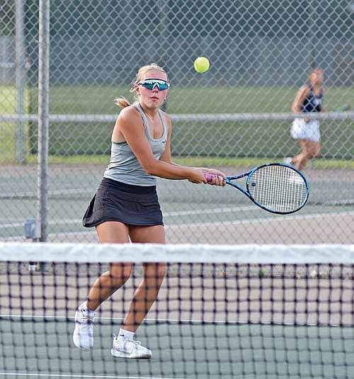 Ali Timmerman hits a groundstroke in her No. 2 doubles match against Marshfield Columbus Tuesday, Sept. 5 at the Lakeland Union High School tennis courts in Minocqua. Timmerman and partner Charley Cleveland helped Lakeland win their fifth match of the season. (Photo by Brett LaBore/Lakeland Times)