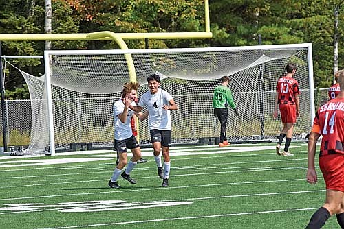 Dominic Gironella (4) celebrates his goal with Brett Peterson in the first half against Shawano Saturday, Sept. 9 at Mike Webster Stadium in Rhinelander. Gironella scored again in the second half. (Photo by Brett LaBore/Lakeland Times)