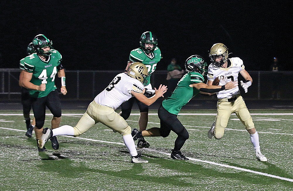 Rhinelander’s Payton Campbell tackles Hayward’s Micah Bacon following a bad snap on a punt during the third quarter of a GNC football game at Mike Webster Stadium Friday, Sept. 8. The special teams play helped set up the Hodags’ go-ahead touchdown as they defeated the Hurricanes 13-7 and improved to 4-0 on the season. (Bob Mainhardt for the River News)