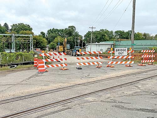 The Phillip Street bridge water main project, one of several infrastructure projects resulting in detours and closed roads in the City of Rhinelander, is expected to be complete in approximately three weeks, according to Mark Barden of Town and Country Engineering. (Photo by Heather Schaefer/River News)