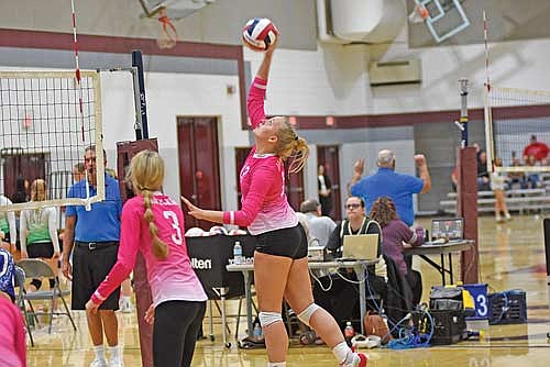 Grace Redenbaugh attacks the ball for a kill in the third set against Northland Pines during the first GNC Meet Saturday, Sept. 16 at Sheldon Fieldhouse in Antigo. (Photo by Brett LaBore/Lakeland Times)