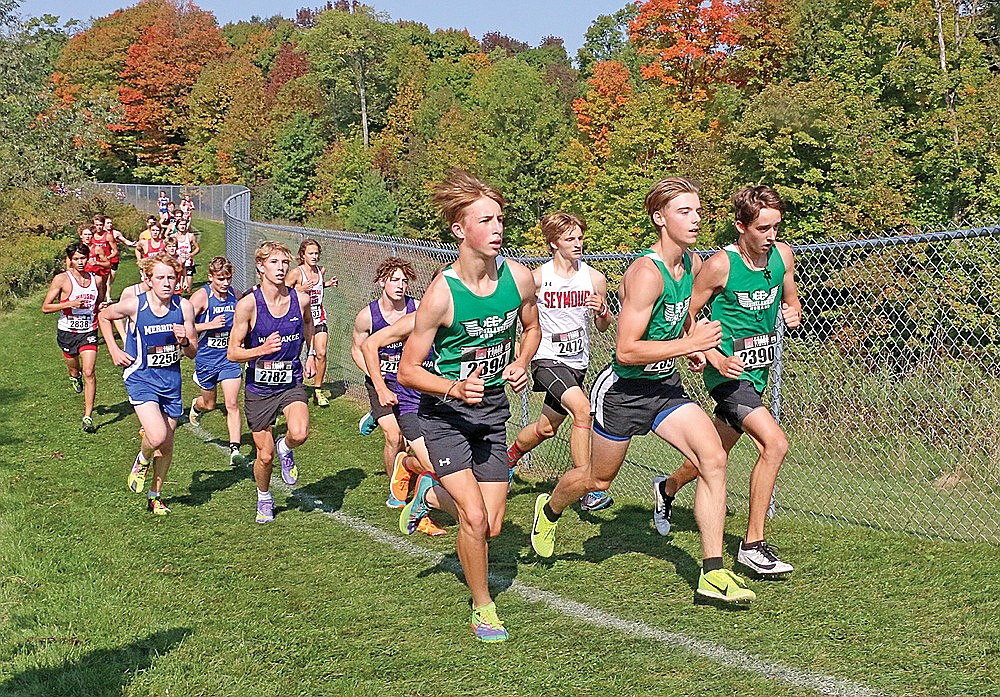 Rhinelander’s Jackson Weinzatl, left, Gavin Denis, center, and Avrom Barr, right, lead a pack of runners during the opening mile of the Bill Smiley Invitational cross country race in Wausau Saturday, Sept. 13. The Hodag boys placed 18th out of 21 teams in Division 1 on Saturday. (Jeremy Mayo/River News)