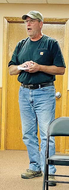 Eric Rempala, a member of the conservation group Oneida County Clean Waters Action, addresses the Lake Tomahawk town board during its Sept. 13 meeting. (Photo by Brian Jopek/Lakeland Times)