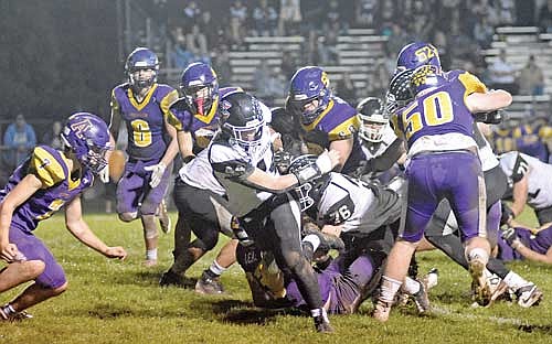 Michael Schettino carries the football in the fourth quarter against Ashland Thursday, Sept. 28, at Oredocker Stadium in Ashland. (Photo by Brett LaBore/Lakeland Times)