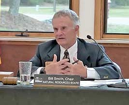 Natural Resources Board chairman Bill Smith expresses his thoughts about the state’s draft wolf plan at a recent meeting in Manitowish Waters. (Submitted photo)