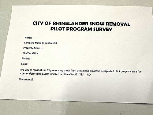 Cty officials have asked property owners in the designated area to fill out this survey regarding the proposed sidewalk snow removal pilot program. (River News photo)