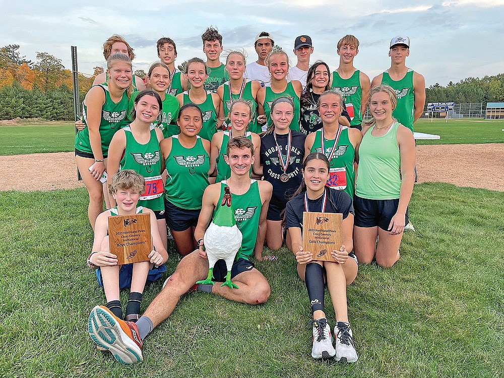 The Rhinelander High School cross country team displays its team plaques after winning the boys’ and girls’ divisions of the Northland Pines Invite in Eagle River Tuesday, Oct. 3. In the front row, from left to right, are Hank Kowieski, Greyson Gremban and Luna Grage. In the second row are Cassie Burke, Maria Hubler, Kara Monk, Leah Jamison, Sophie Miljevich and Aubryn Clark. In the third row are Grace Cornelius, Alyssa Smits, Kyleah Hartman, Hayley Schiek, Ella Miljevich and Brynn Teter. In the back row are Jonathan Campbell, Avrom Barr, Brody Kowieski, Augustus Porter, Shawn Denis, Jackson Weinzatl and Gavin Denis. (Jeremy Mayo/River News)