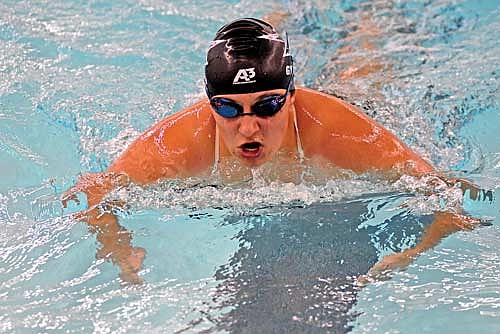 Sophia Gyuro takes a breath in the 100 breaststroke during a meet against Medford Thursday, Oct. 5 at the Lakeland Union High School pool in Minocqua. Gyuro swam in her final home meet as part of Senior Night. (Photo by Brett LaBore/Lakeland Times)