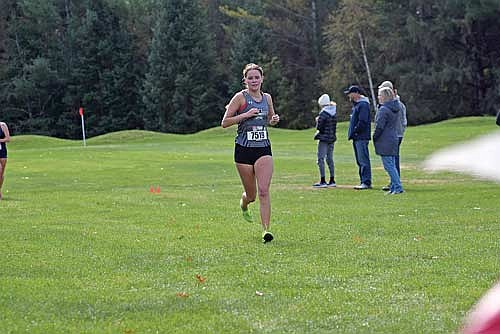 Emma Smith approaches the finish line of the Hatchet Invite Saturday, Oct. 7 at Inshalla Country Club in Tomahawk. Smith had a 55-second PR and time of 23:22.9. (Photo by Brett LaBore/Lakeland Times)