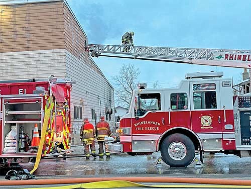 In this file photo, Rhinelander firefighters are seen fighting a fire at R & T’s Dinky Diner (230 Thayer Street) on the afternoon of March 28, 2023. (Photo by Heather Schaefer/River News)