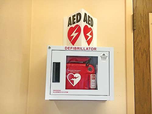 With assistance from the Rhinelander Community Foundation, the Rhinelander District Library has purchased an AED. The device was installed on the main floor of the library near the parking lot entry. (Submitted photo)