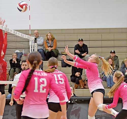 Grace Redenbaugh sends the ball over the net during a Senior Night match against Medford Tuesday, Oct. 10 at the Lakeland Union High School fieldhouse in Minocqua. The Thunderbirds finished 8-4 for third place in the conference standings, both program bests in the GNC. (Photo by Brett LaBore/Lakeland Times)