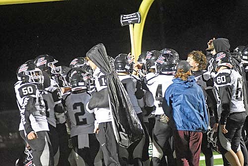 The Thunderbirds hold up the Northwoods Axe after a 32-6 win over Rhinelander Friday, Oct. 13 at Mike Webster Stadium in Rhinelander. The Thunderbirds beat the Hodags in Rhinelander for the first time since 2015. (Photo by Brett LaBore/Lakeland Times)