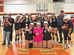 The Tigers celebrate their eighth straight regional championship after a 3-1 win over Luck Saturday, Oct. 21 at John “JP” Pierpont Court in Mercer. Tigers pictured, front from left, are Jenny Klopatek, Ava Milashus, Amber Eith; back row, Megan Heyen, assistant coach Kelly Kohegyi, Kaylee Powers, Ona Ruiz, Anya Brandenburg, Eiley Schoeneman, Ryley Saarnio, Tyla Tourtillott, Rylinn Rossi, assistant coach Bob Schenk and coach Robyn Schoeneman. (Contributed photograph)