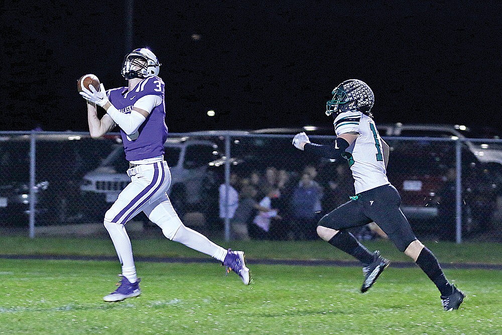 Onalaska’s Isaac Skemp beats Rhinelander’s Kyrle Vanney over the top for a 41-yard touchdown during the first quarter of a WIAA Division 3 Level 1 playoff game in Onalaska Friday, Oct. 20. Onalaska scored 27 points in the first on its way to a 56-6 rout of the Hodags. (Bob Mainhardt for the River News)