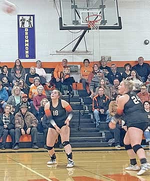 The Tigers’ Amber Eith (18) watches as Eiley Schoeneman gets ready to bump the volleyball during the first set of the Tigers’ WIAA Division 4 sectional semifinal match against Frederic Thursday, Oct. 26 at John “JP” Pierpont Court in Mercer. (Photos by Brian Jopek/Lakeland Times)