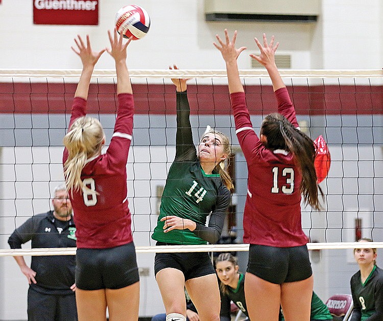 In this Oct. 10, 2023 file photo, Rhinelander’s Lily Treder attempts to swing through a double block by Antigo’s Lily Muraski (8) and Mya Burt (13) during the third set of a GNC volleyball match in Antigo. Treder led the Hodags in attacking percentage this season and was one of two Hodags to earn all-conference honors. (Bob Mainhardt for the River News)