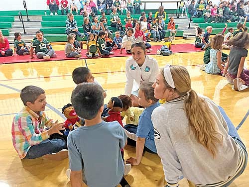 2022 Miss Wisconsin Pre-Teen Leia Rios speaks with 4K and second-grade students during a bully prevention month presentation on Friday, Oct. 27, at Lac du Flambeau Public School. (Photo by Trevor Greene/Lakeland Times)