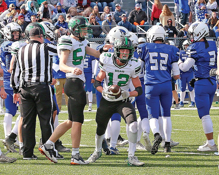 In this Oct. 7, 2023 file photo Rhinelander’s Truman Lamers reacts after recovering a fumble during the second half of a GNC football game at Merrill. The Hodags won that game 7-0, which proved to be a playoff-clinching victory for the team. (Bob Mainhardt for the River News)