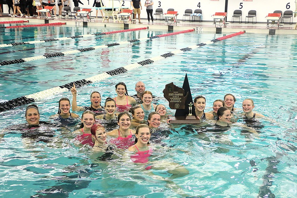 The Rhinelander High School girls' swim team celebrates after winning the WIAA Division 2 state championship in Waukesha Friday, Nov. 10. It was the Hodags' second state championship in four years. (Jeremy Mayo/River News)