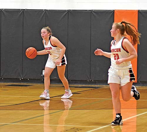 In this Dec. 6, 2022 file photo, Jenny Klopatek dribbles the ball up the court in a game against Solon Springs at Coach Leverson Court in Mercer. Klopatek will be one of the leaders for the Tigers in 2023-24. (Photo by Brett LaBore/Lakeland Times)