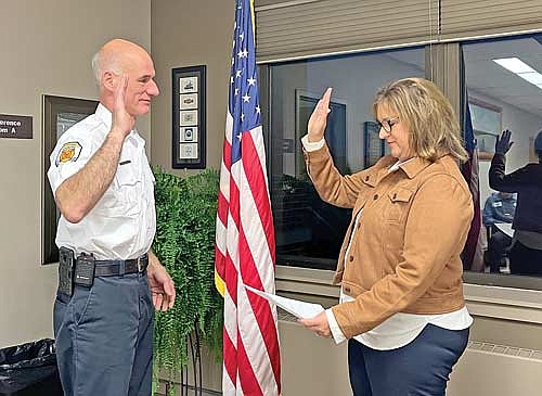 Richard Carani is sworn-in as new fire chief during a town board meeting on Tuesday, Nov. 6, in Minocqua. (Photo by Trevor Greene/Lakeland Times)