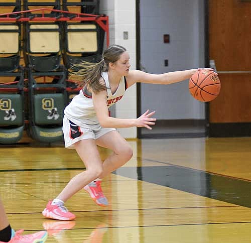 Kaylee Powers attempts to save the ball in the first half of the season opener against Chequamegon Tuesday, Nov. 14 at Chequamegon High School in Park Falls. (Photo by Brett LaBore/Lakeland Times)