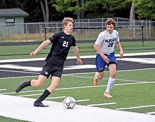 In this Aug. 22, 2023 file photo, Brady Wolfe possesses the ball in the second half of a game against Three Lakes at IncredibleBank Field in Minocqua. (Photo by Brett LaBore/Lakeland Times)