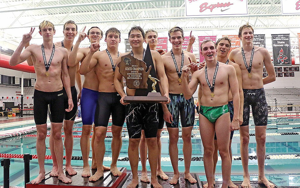 In this Feb. 17, 2023 file photo, the Rhinelander High School boys’ swim team poses with the WIAA Division 2 state championship trophy following the state meet in Waukesha. The Hodags have a tough act to follow as they start the 2023-24 season with only four swimmers back from that squad. (Jeremy Mayo/River News)